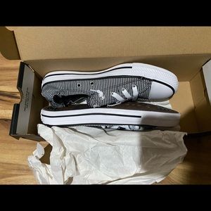 Woman’s converse shoes, size 8. Brand new in box.